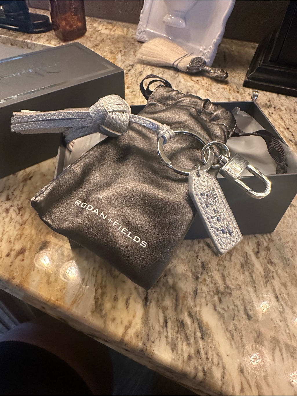 Rodan  Fields Metallic Silver Leather Key  Tassel Holder